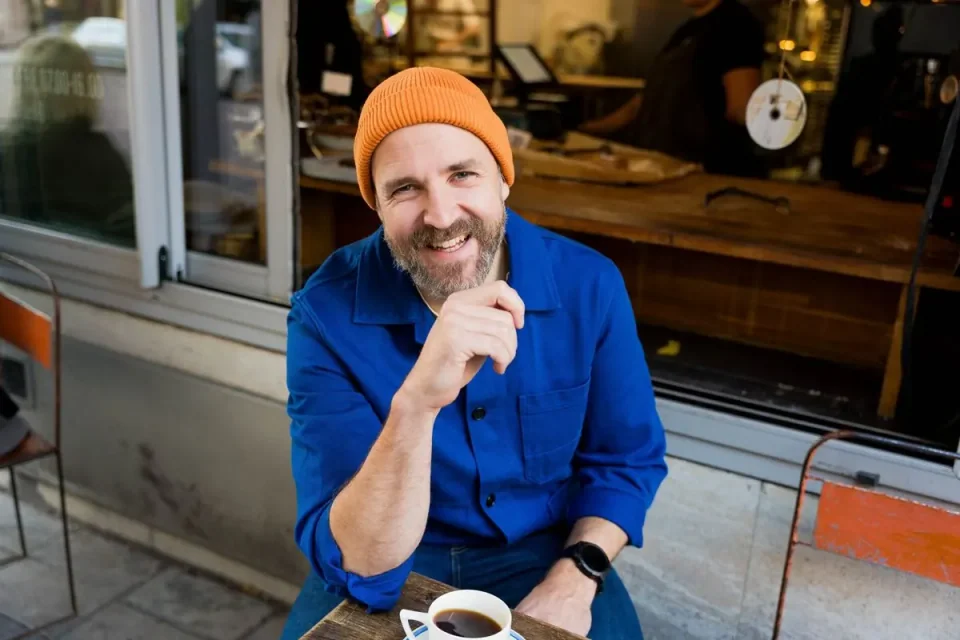 Johannes Sundlo in an orange beanie and blue shirt